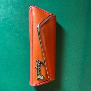 Sourpuss Orange and Pink Cosmetic Case with Sleek Design